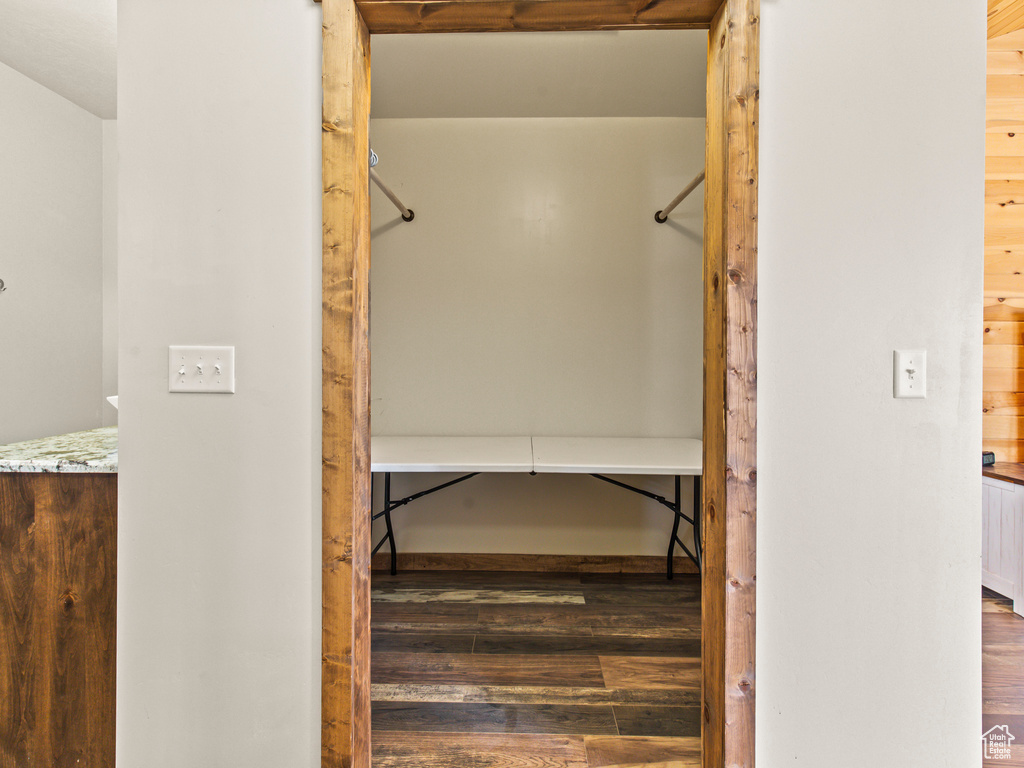 Walk in closet featuring hardwood / wood-style flooring