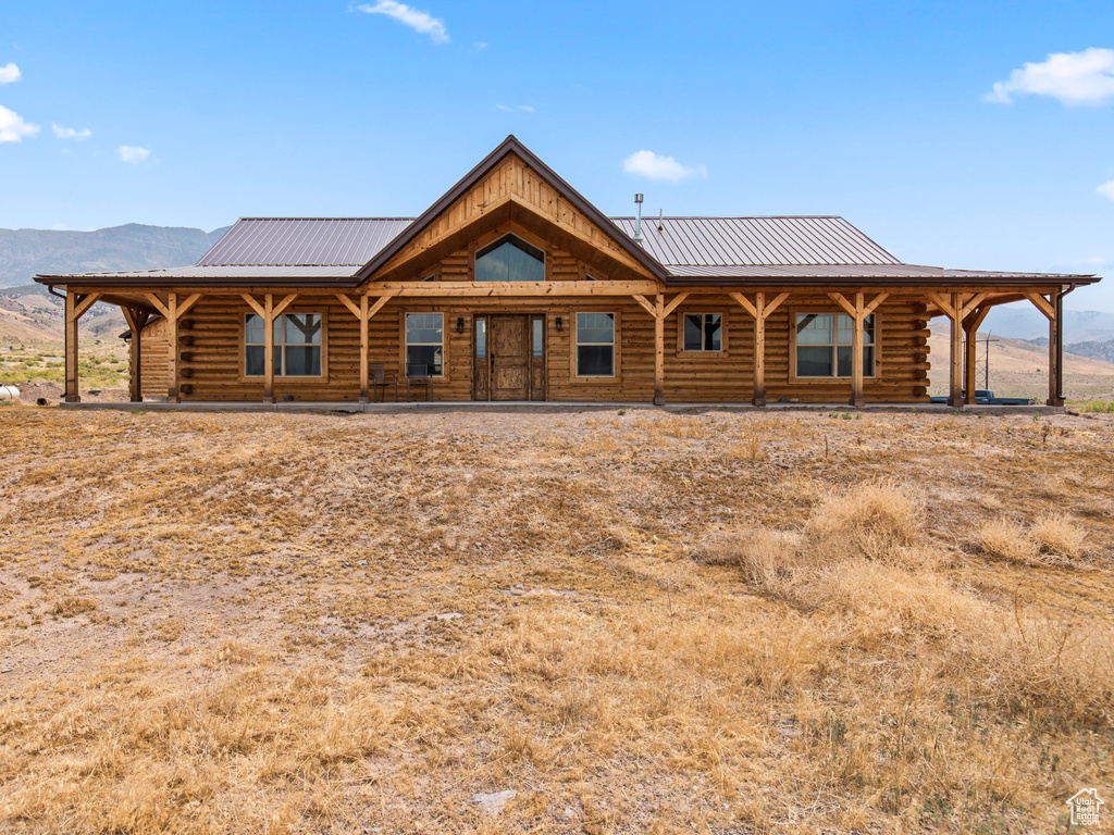 Log home with covered porch