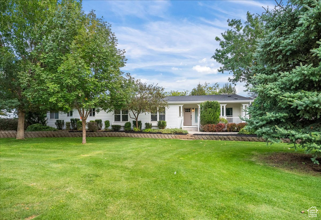 View of front of home with a front yard