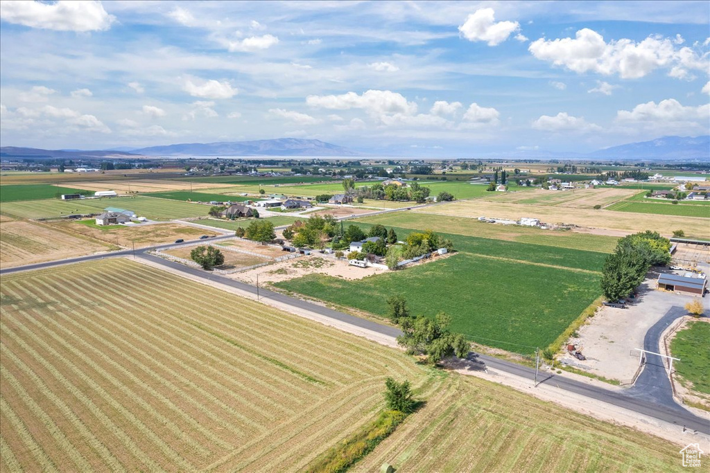 Birds eye view of property featuring a rural view