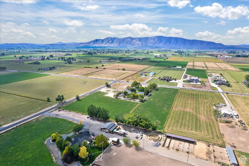 Birds eye view of property featuring a mountain view and a rural view