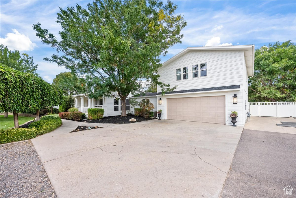 View of front of home featuring a garage