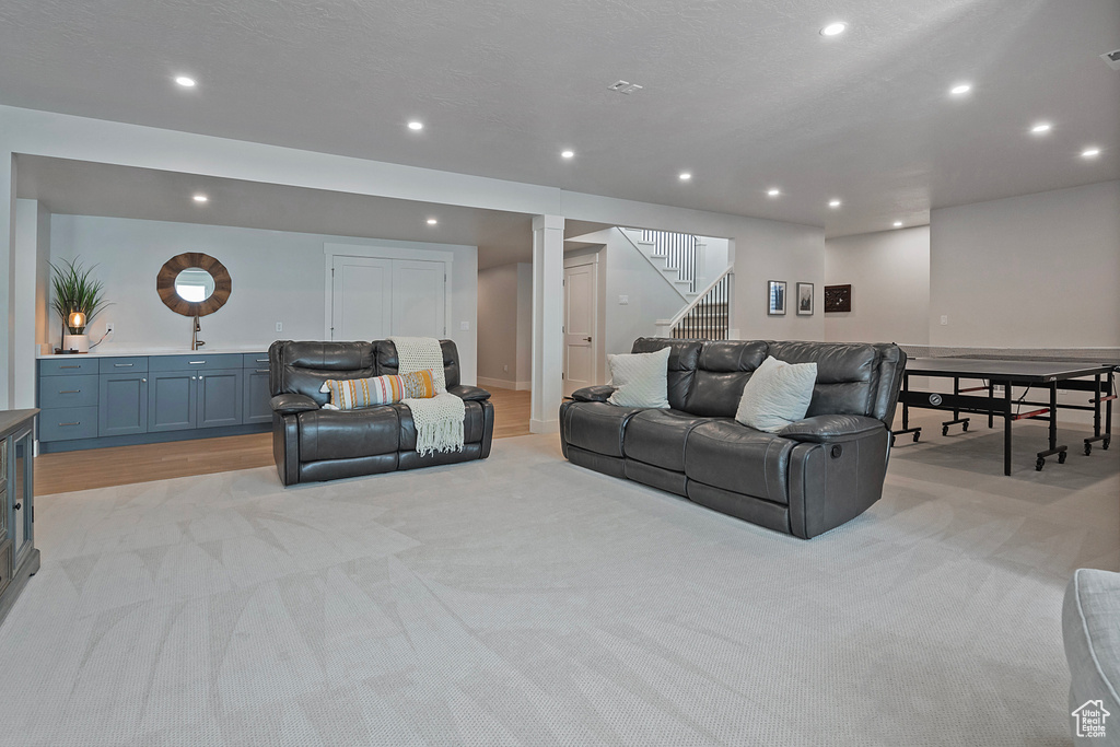 Living room with light colored carpet