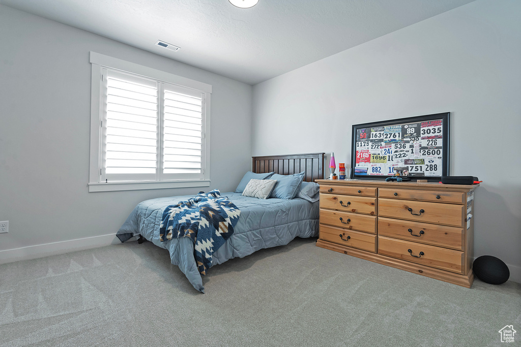 View of carpeted bedroom