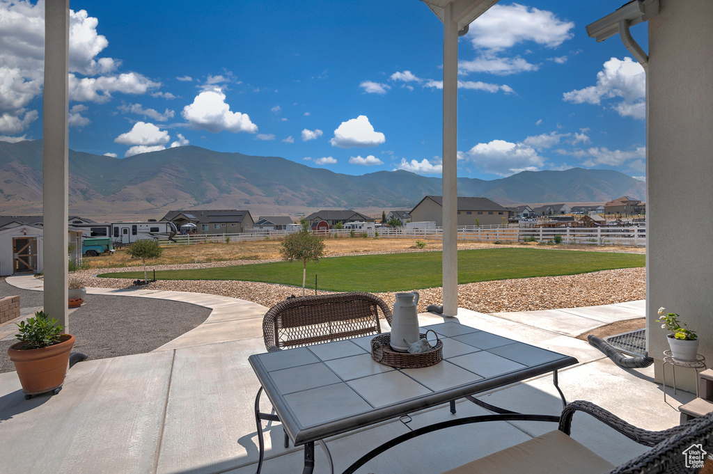 View of patio with a mountain view