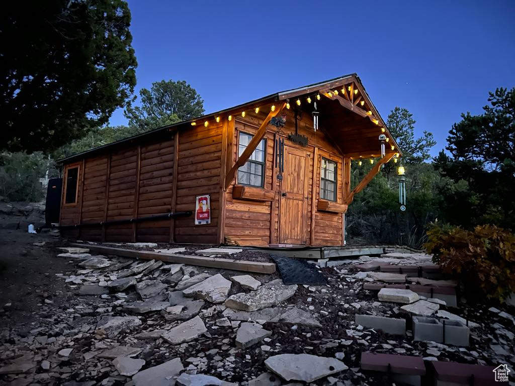 View of property exterior at night