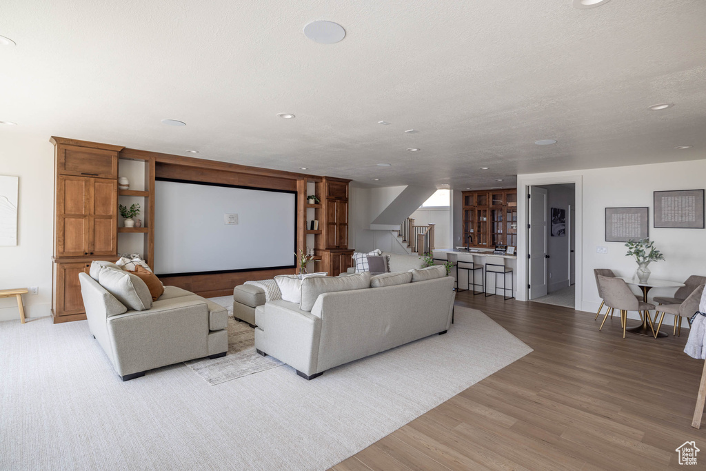 Living room with light hardwood / wood-style flooring