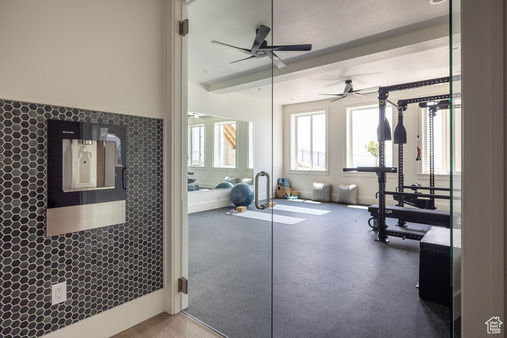 Exercise area with ceiling fan