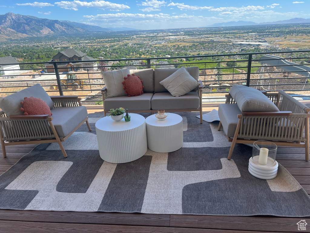 View of patio featuring outdoor lounge area and a mountain view