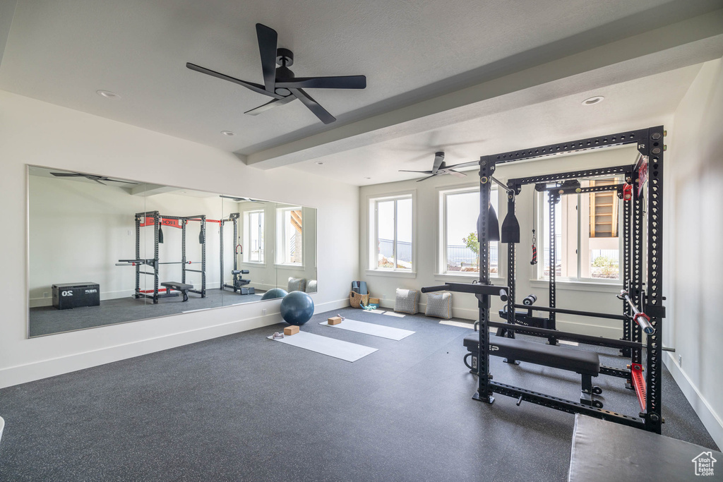 Workout area featuring ceiling fan