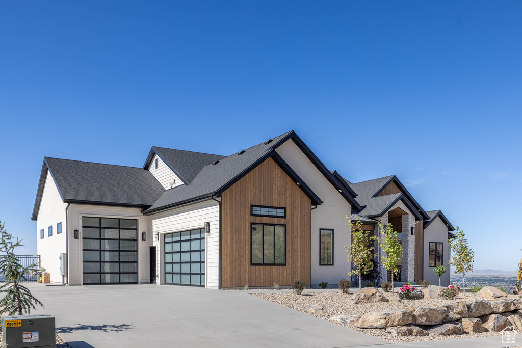 Modern farmhouse featuring a garage