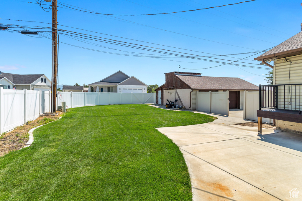 View of yard with a patio area