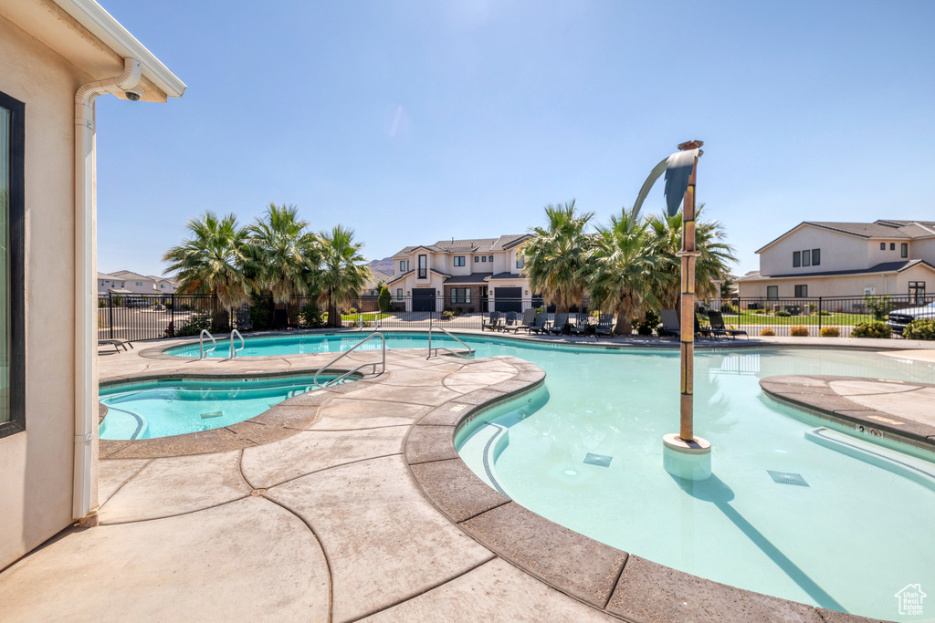 View of swimming pool featuring a patio