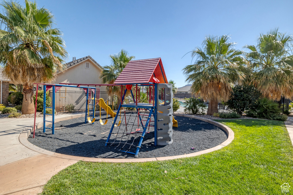 View of play area with a yard