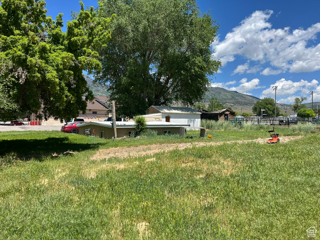 View of yard with a mountain view