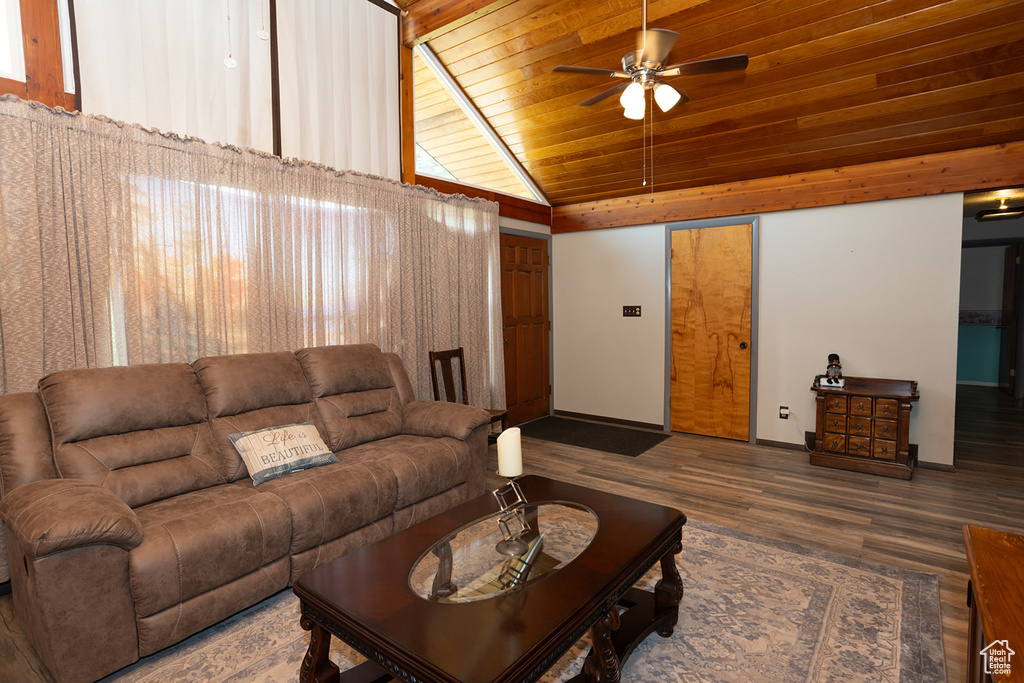 Living room featuring high vaulted ceiling, wooden ceiling, ceiling fan, and hardwood / wood-style floors