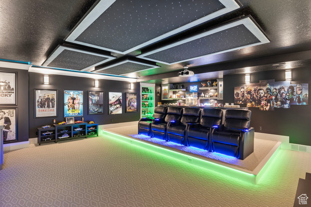 Interior space with carpet floors and coffered ceiling