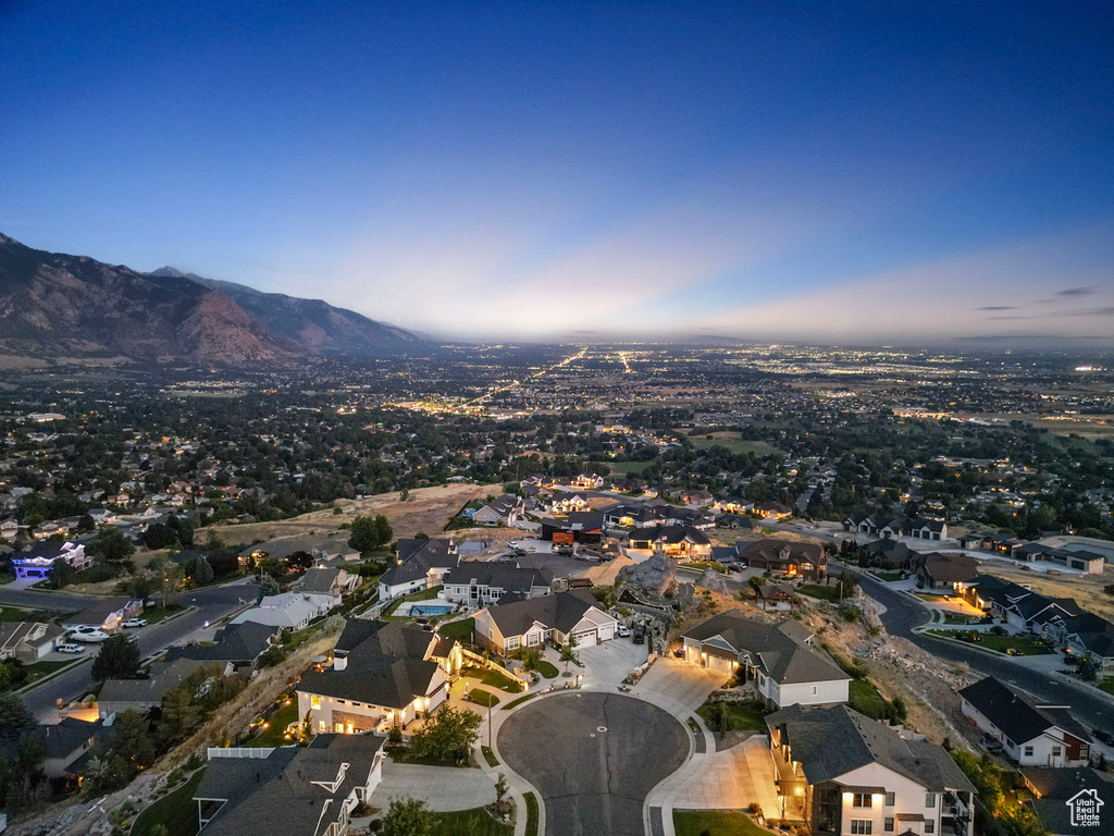 Birds eye view of property with a mountain view