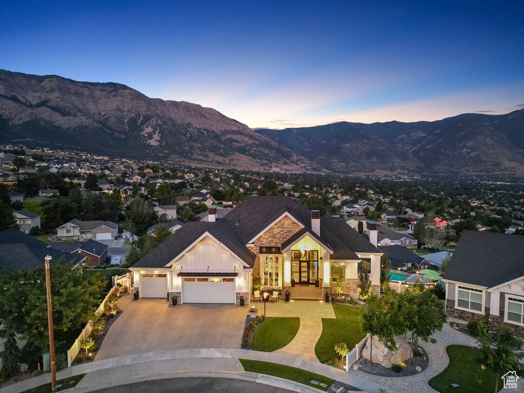 Exterior space featuring a garage and a mountain view