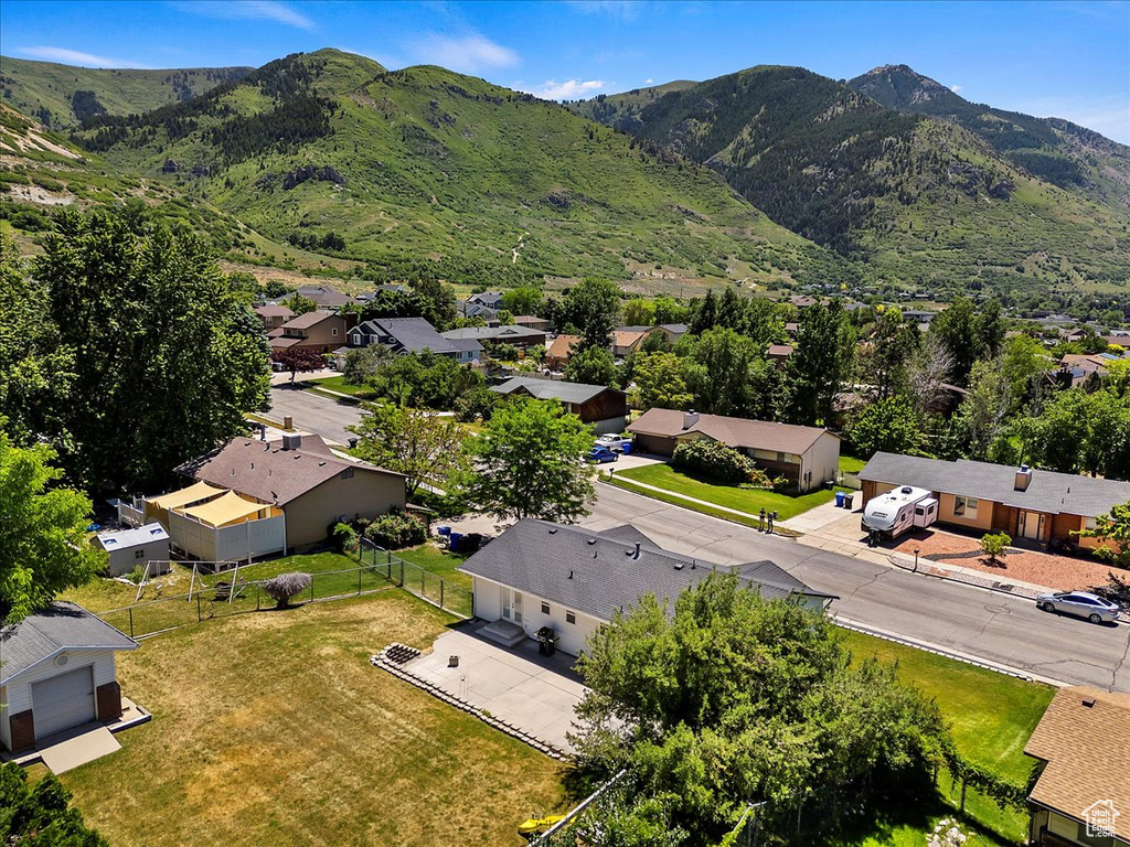 Birds eye view of property with a mountain view