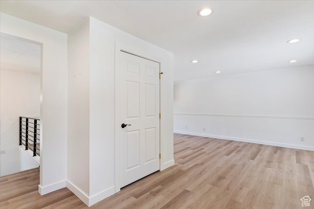 Hallway featuring light wood-type flooring