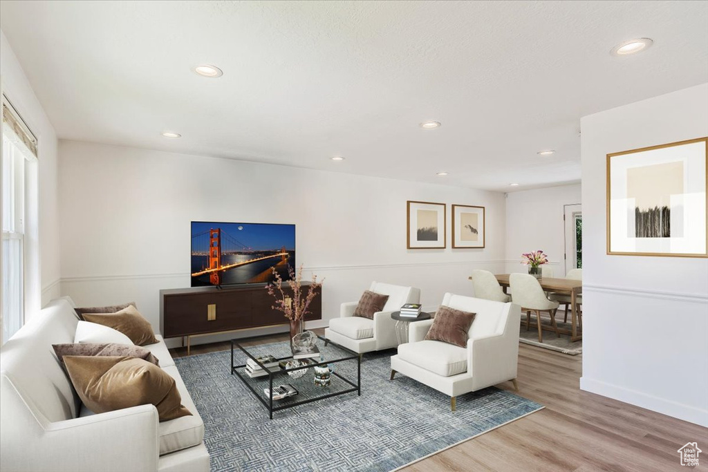 Living room with wood-type flooring