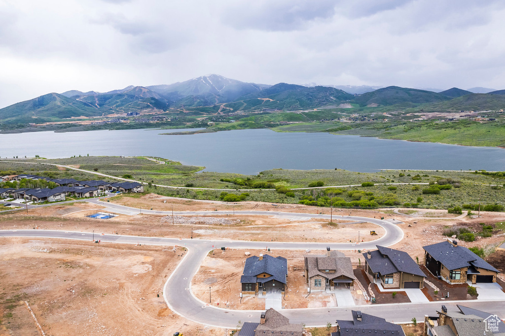 Bird's eye view with a water and mountain view