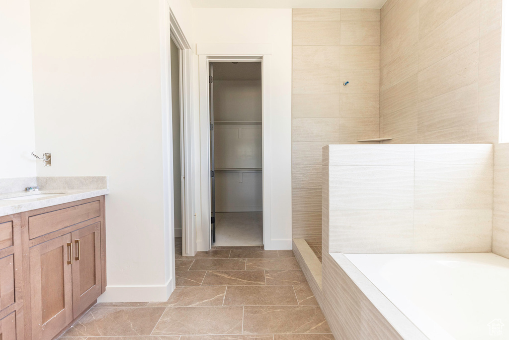 Bathroom with separate shower and tub and vanity