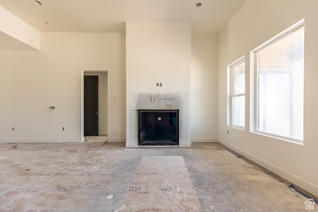 Unfurnished living room with a fireplace