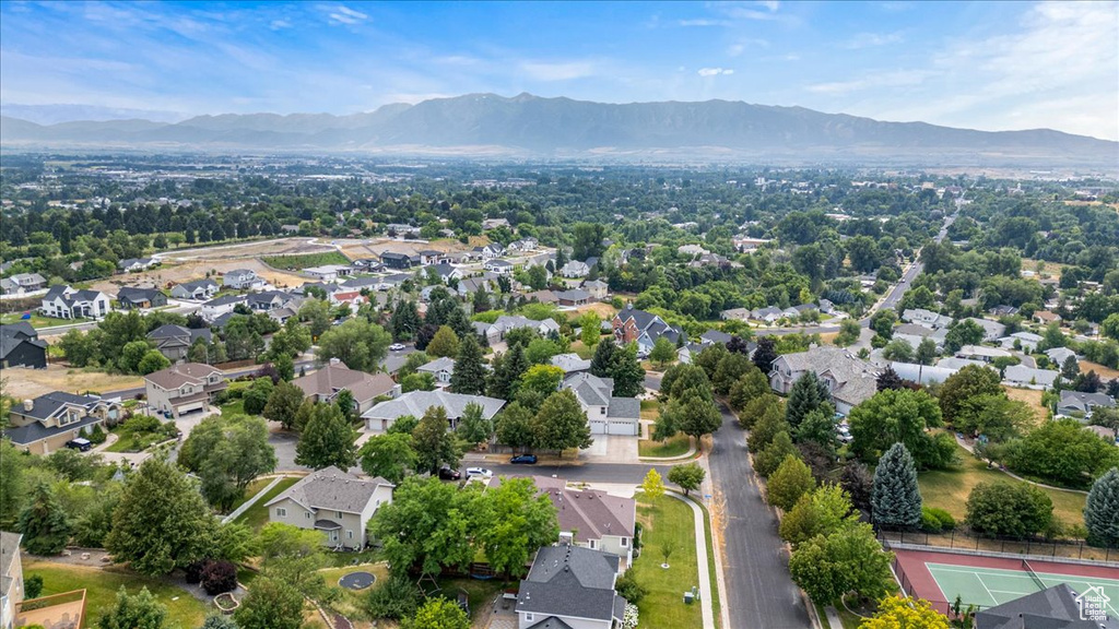 Birds eye view of property with a mountain view