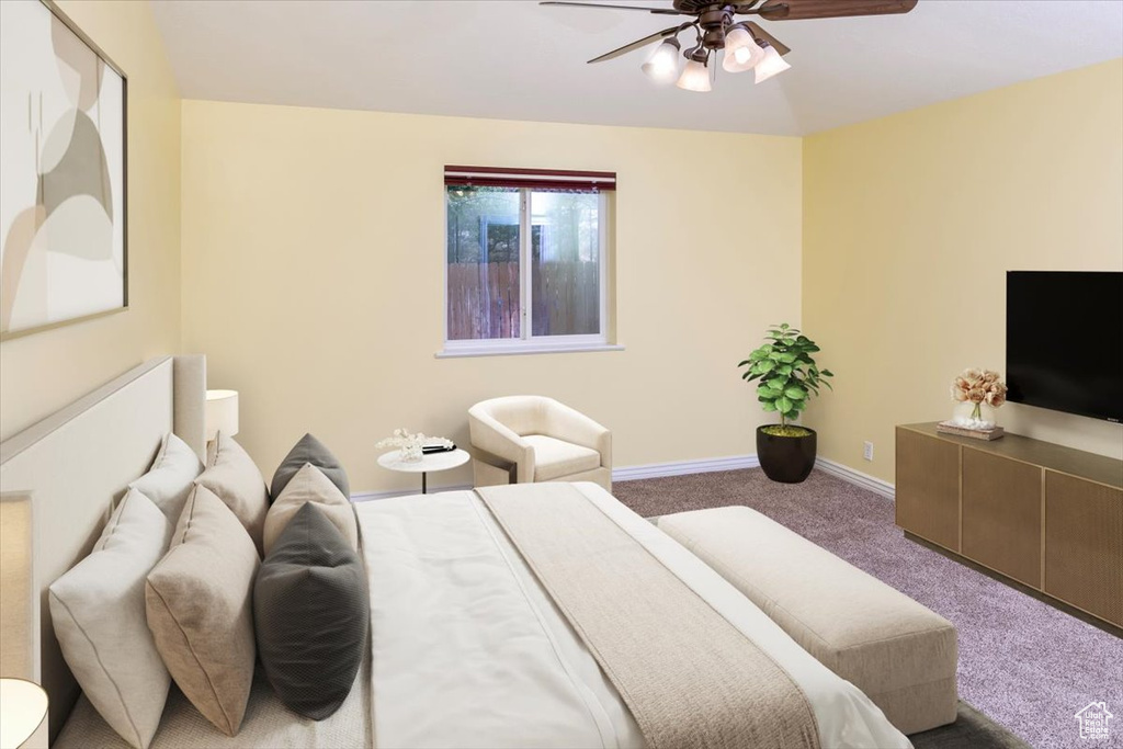 Carpeted bedroom with ceiling fan