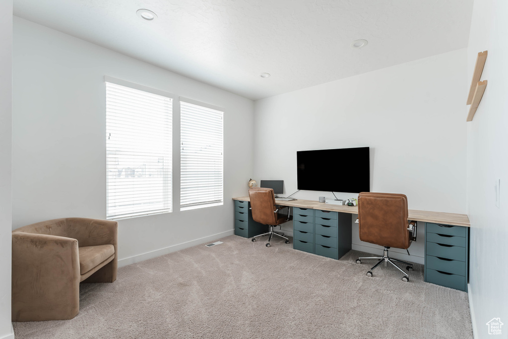 View of carpeted home office