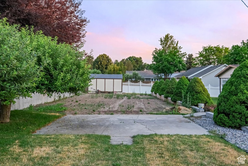 View of yard at dusk