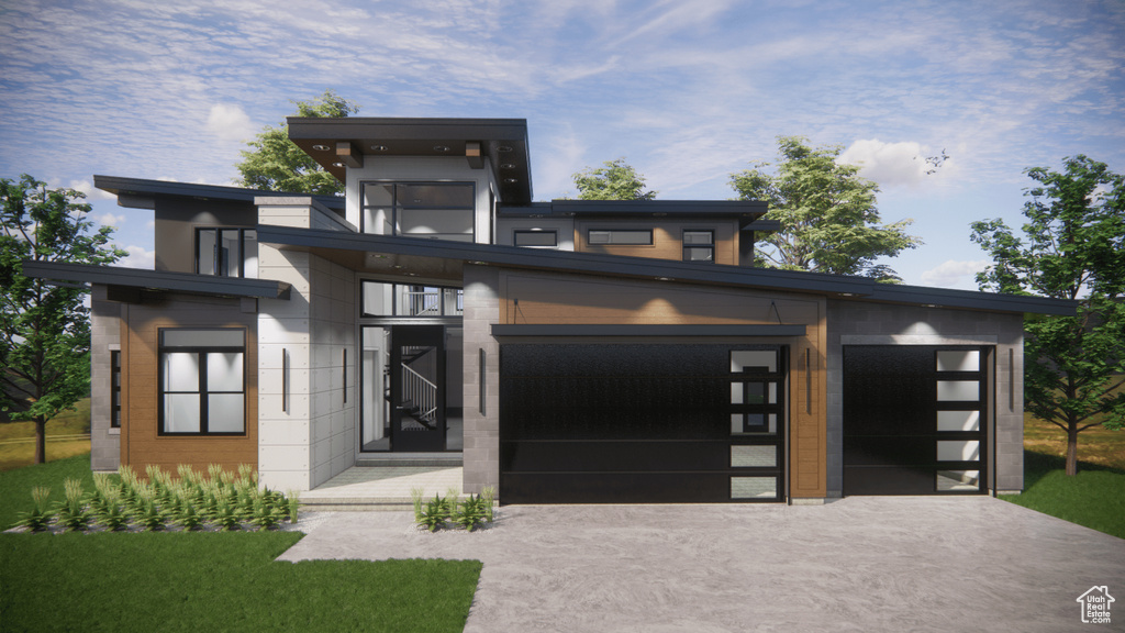 Contemporary house featuring a garage and an outbuilding