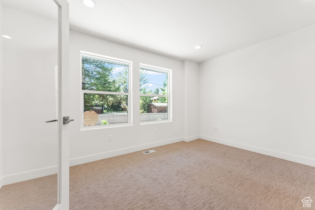 Unfurnished room featuring carpet floors