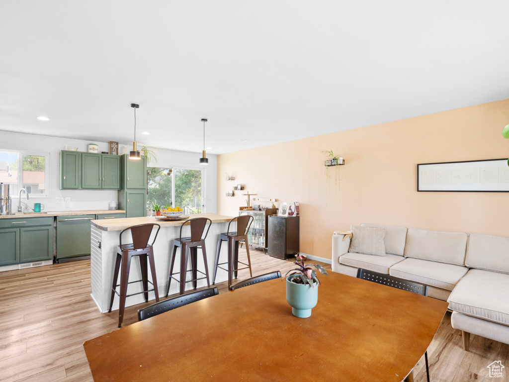 Dining area featuring light hardwood / wood-style floors