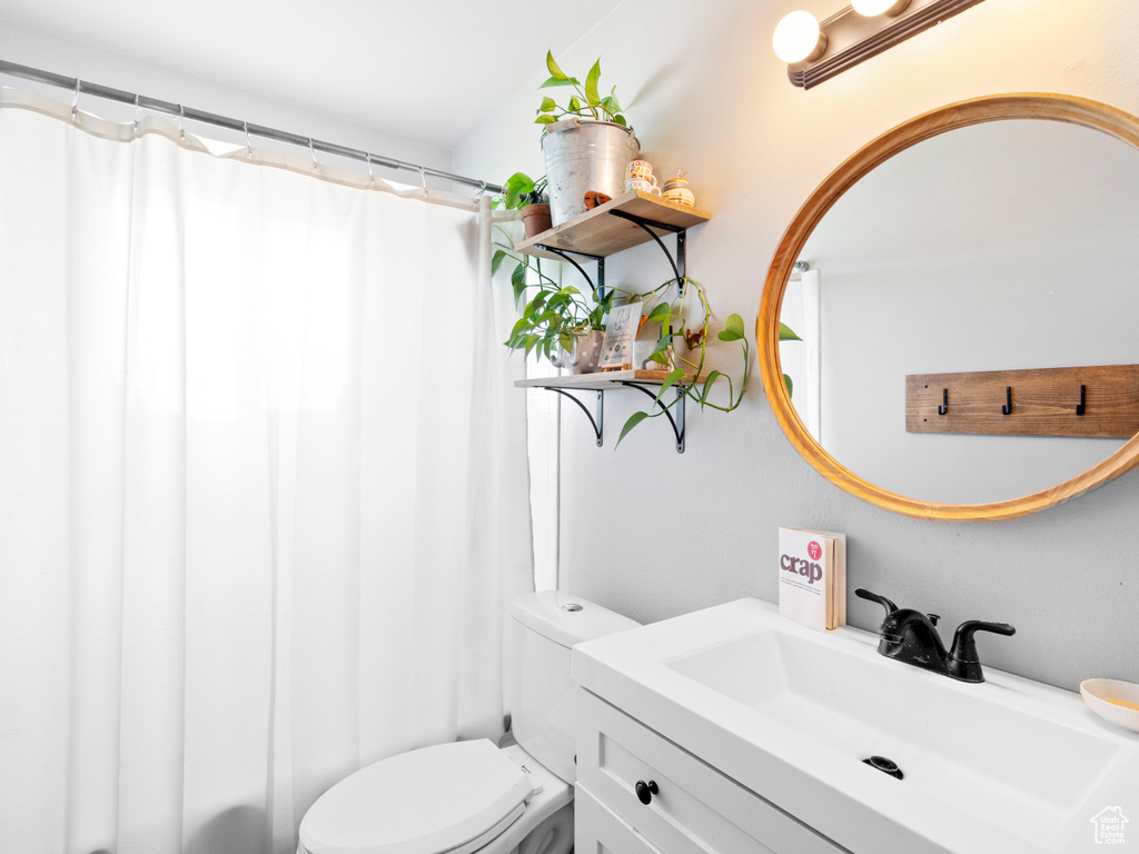 Bathroom with vanity and toilet