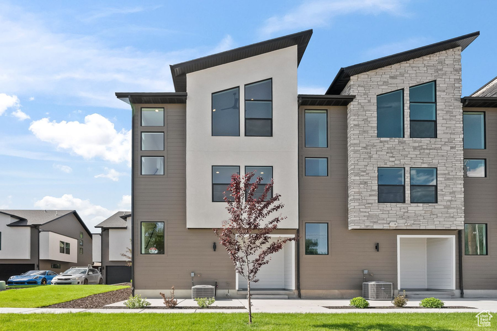 Modern home featuring central air condition unit