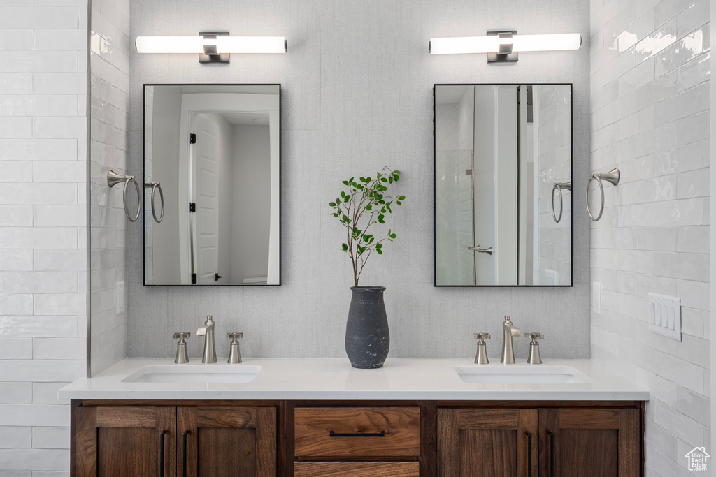 Bathroom featuring double sink vanity