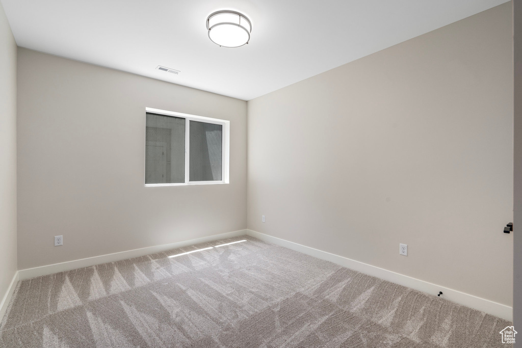 Unfurnished room featuring carpet floors