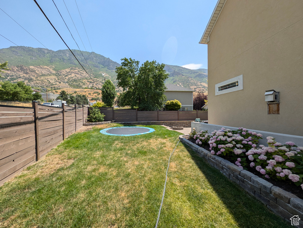 View of yard with a mountain view