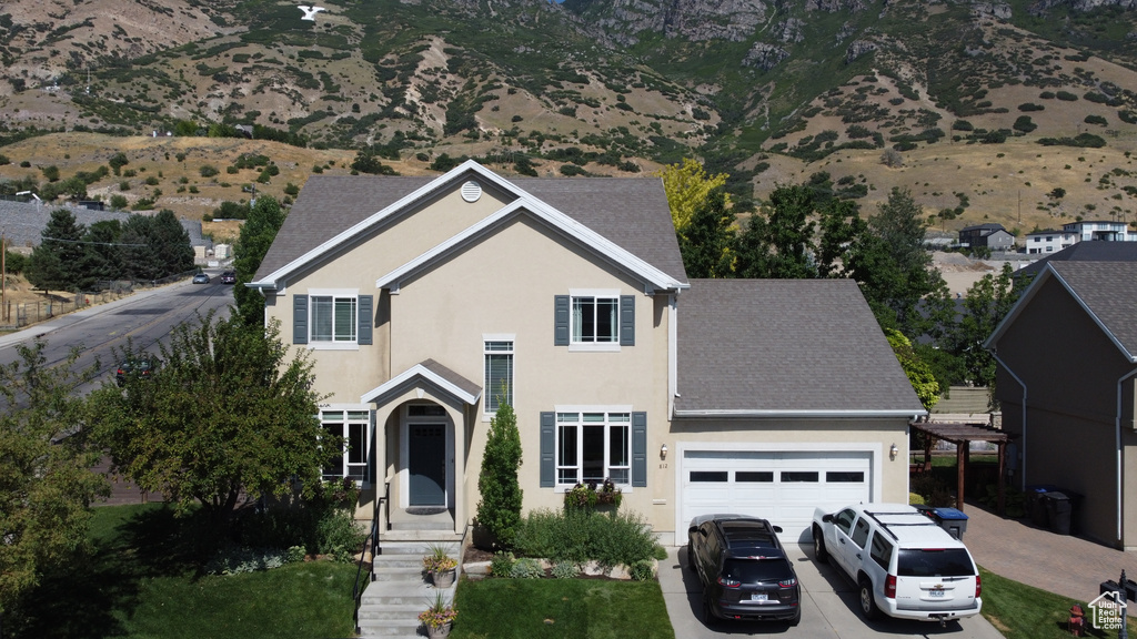 View of front property with a garage