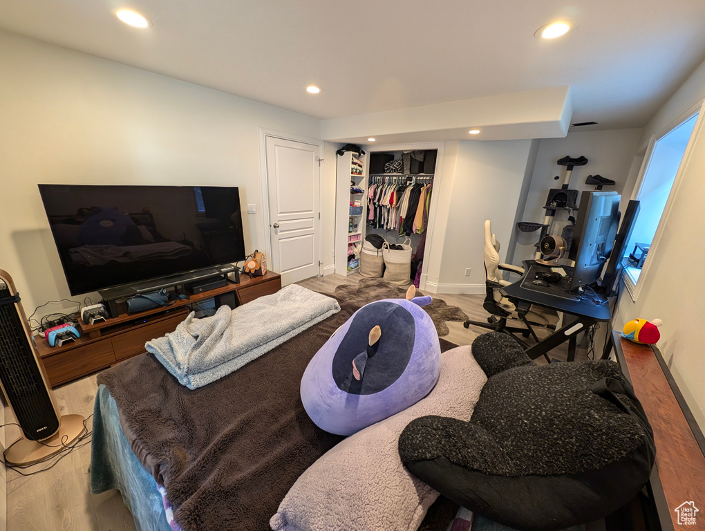 Living room with hardwood / wood-style floors