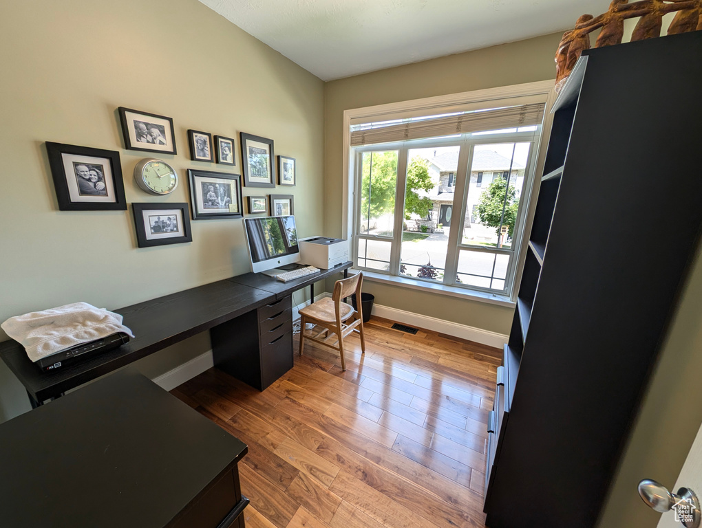 Office featuring wood-type flooring