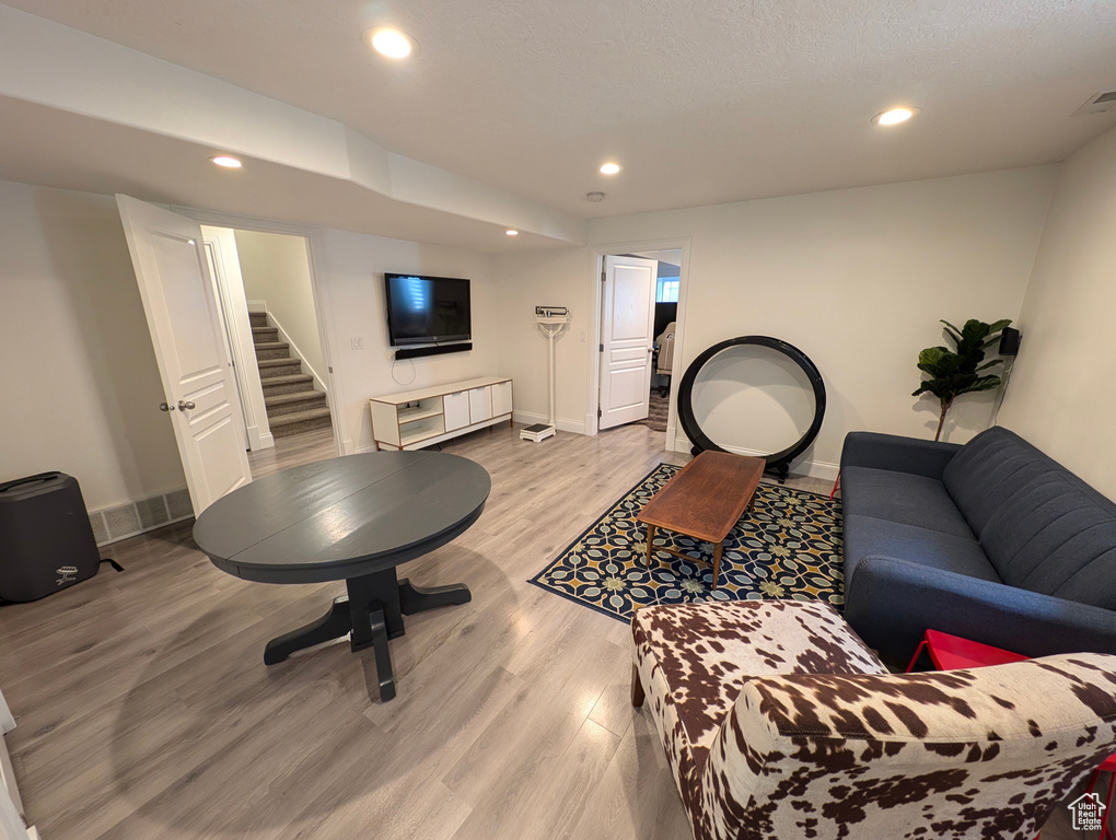 Living room featuring hardwood / wood-style flooring