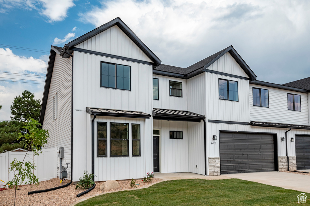 View of front of house with a garage