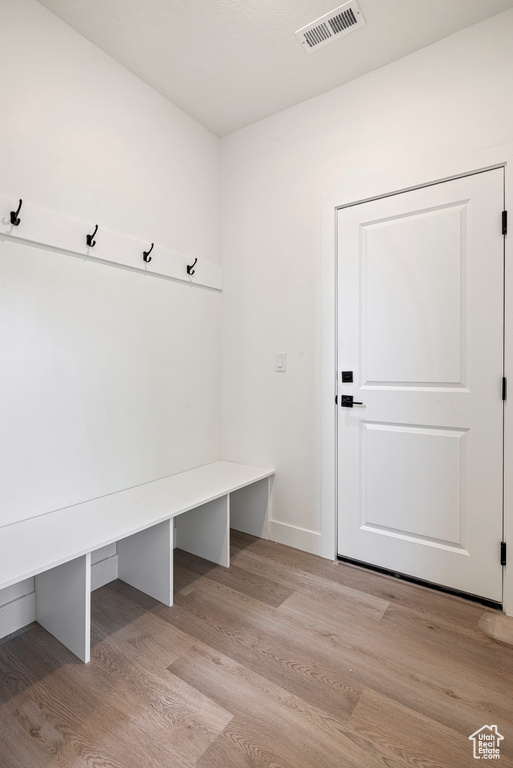 Mudroom featuring hardwood / wood-style floors