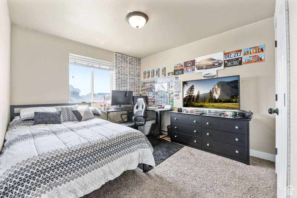 Bedroom featuring carpet