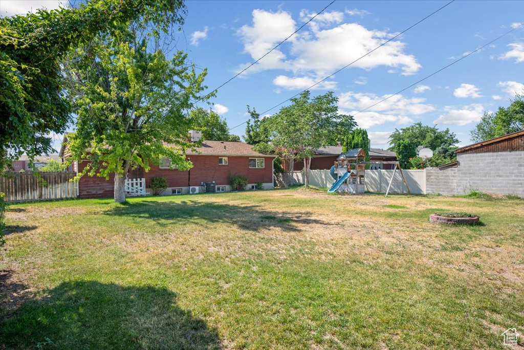 View of yard with a playground