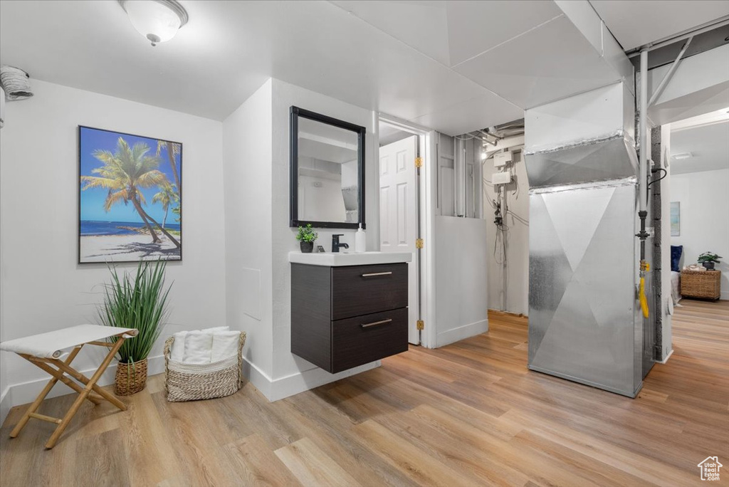 Bathroom featuring vanity and hardwood / wood-style flooring